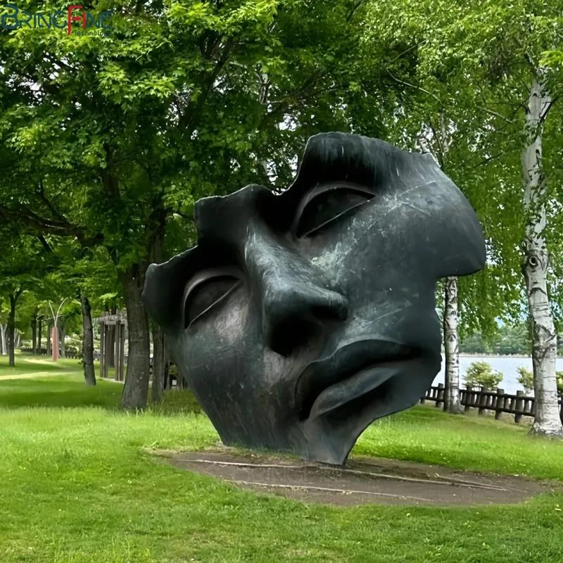 Abstract Bronze Face Sculpture